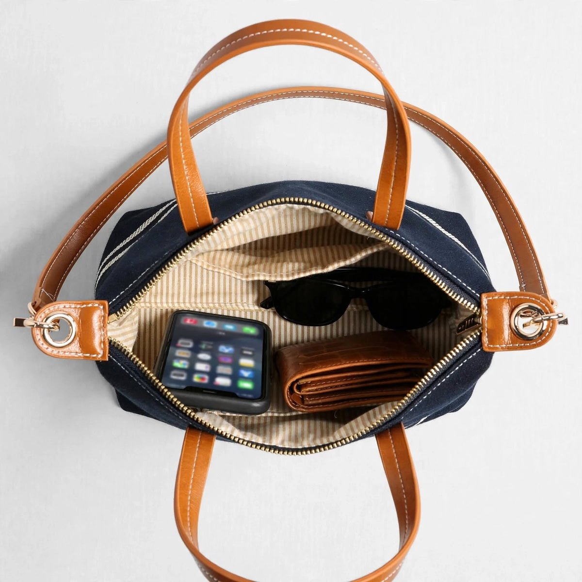 RIVIERA – Mini-Tote Canvas Navy & Leder Cognac – Umwandelbare Umhängetasche