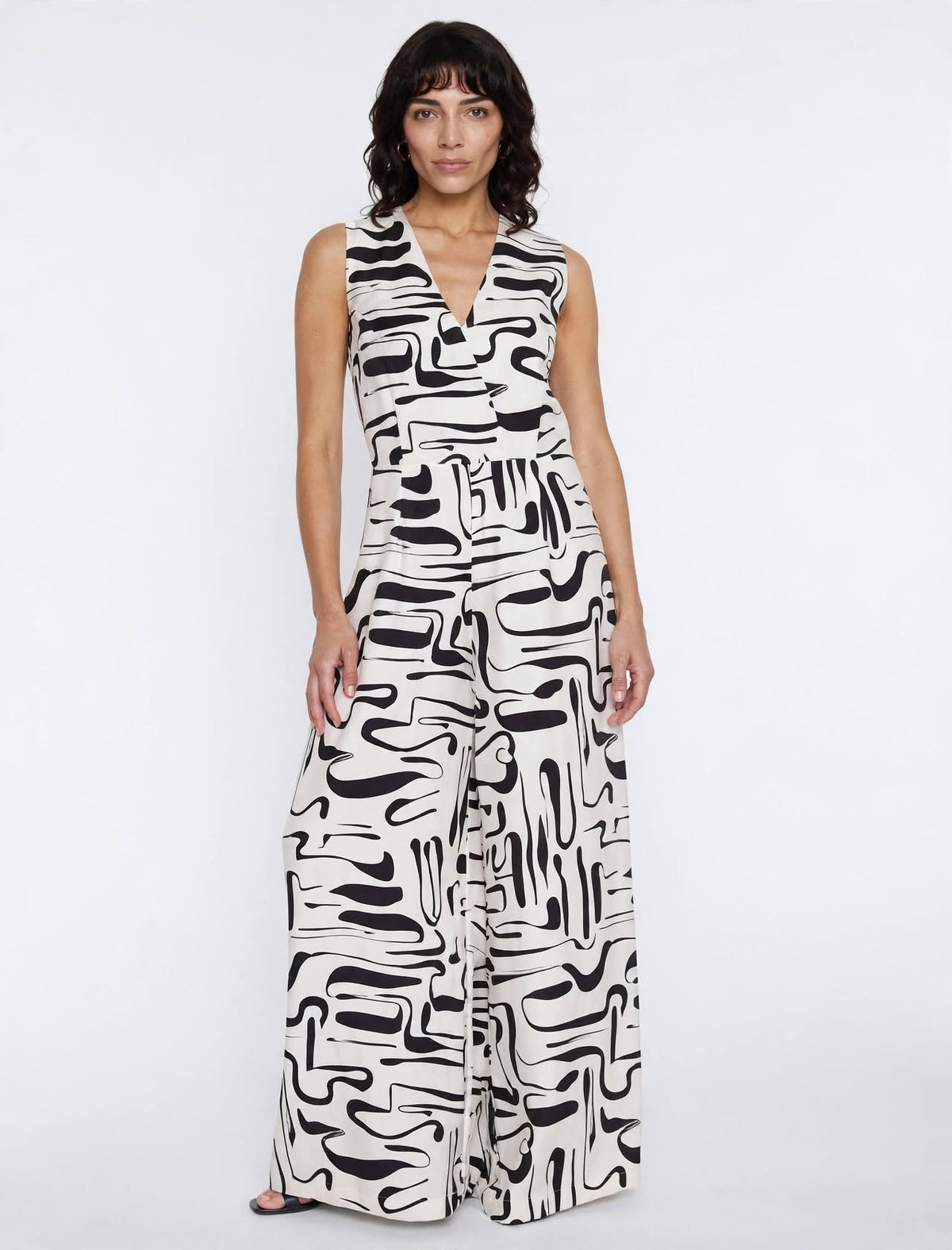 Black & ecru graphic print jumpsuit, sleeveless V-neck.