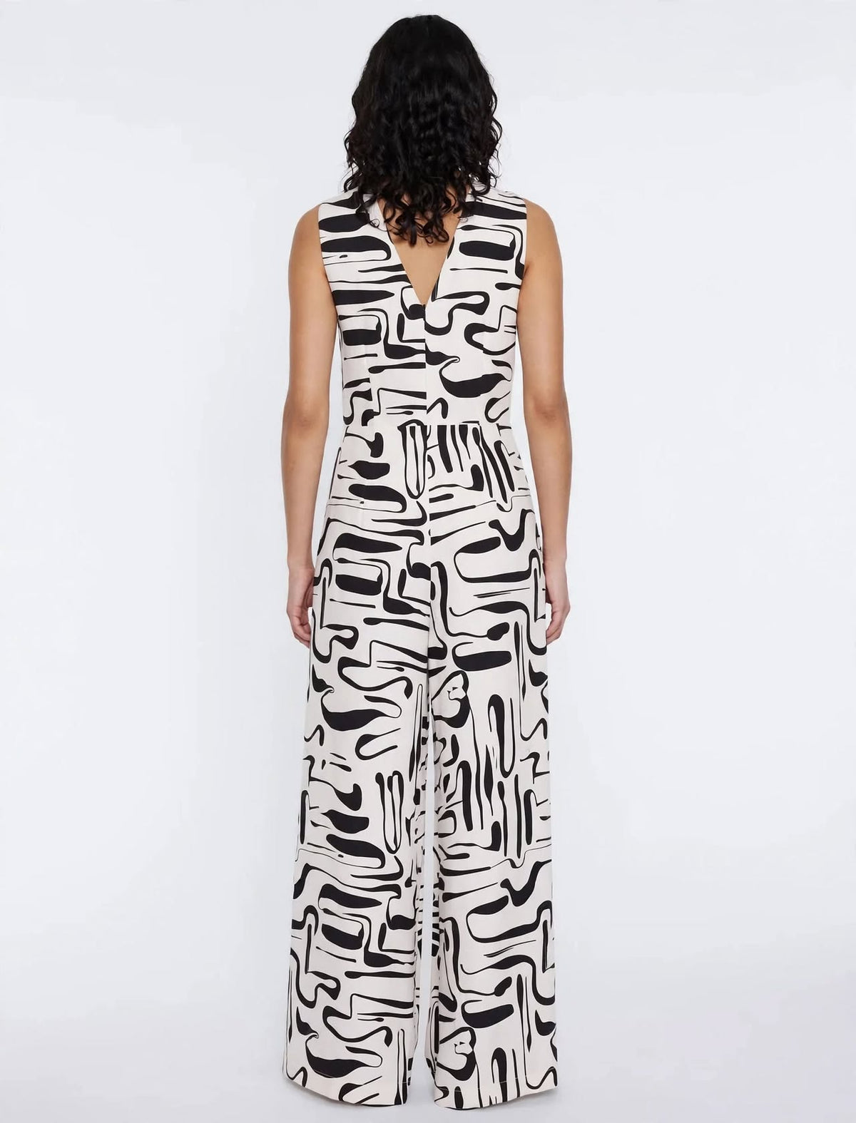 Black & ecru graphic print jumpsuit, sleeveless V-neck.